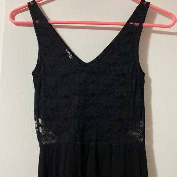 Black mini dress with lace back and lace side detail. - Picture 3 of 7